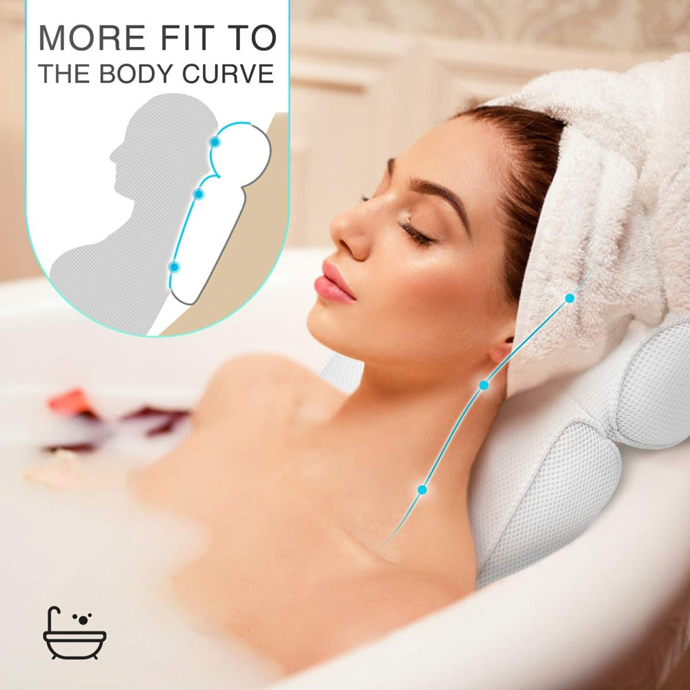 Lady laying on bathtub pillow 