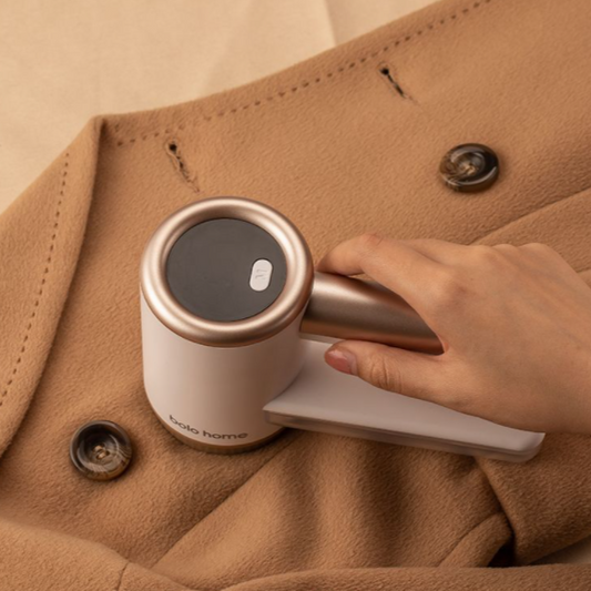 Lint Remover Removing Lint From Coat 