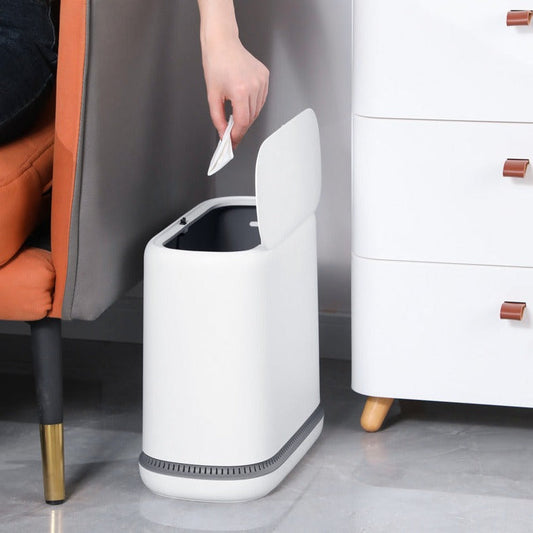 Man throwing Trash in Automatic Dustbin